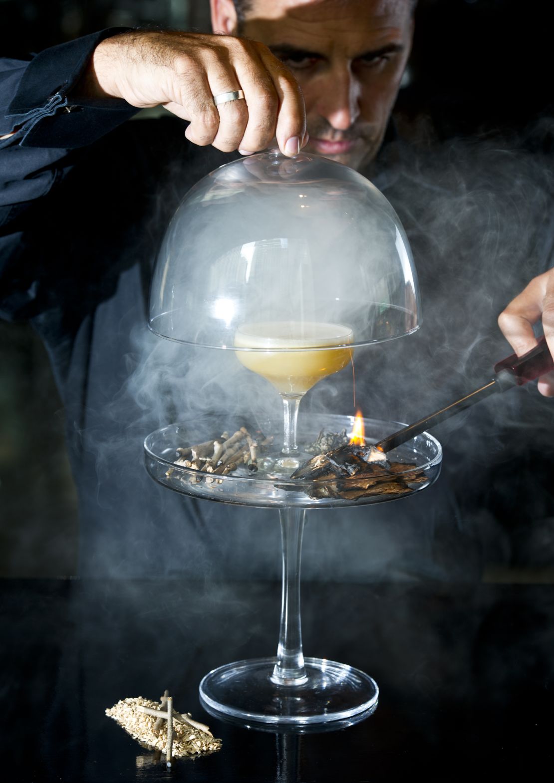 Gin is infused with with "gunpowder flavors" and shaken with fernet branca and egg white.