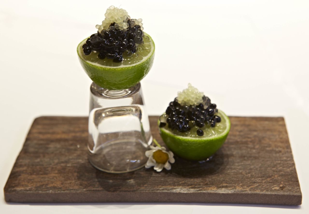 Doug Laming uses a Cointreau Caviar Spherification kit to create "pearls" of alcohol that burst in the mouth.  