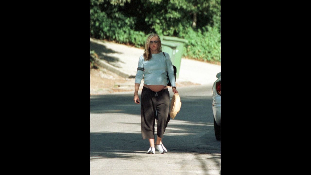 Pregnant with her second child, Rocco, Madonna walks to her car on August 11, 2000, in Hollywood Hills, California. 