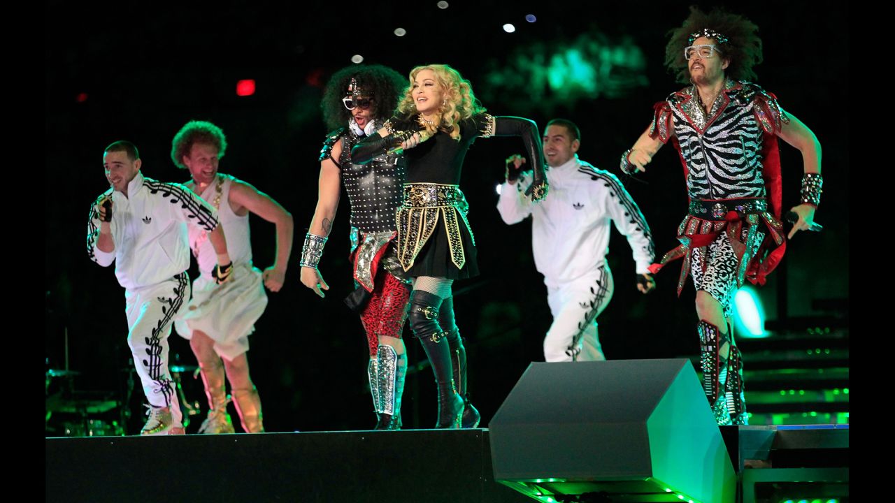 LMFAO and Madonna take the field during the halftime show of Super Bowl XLVI in Indianapolis, Indiana, on February 5, 2012.