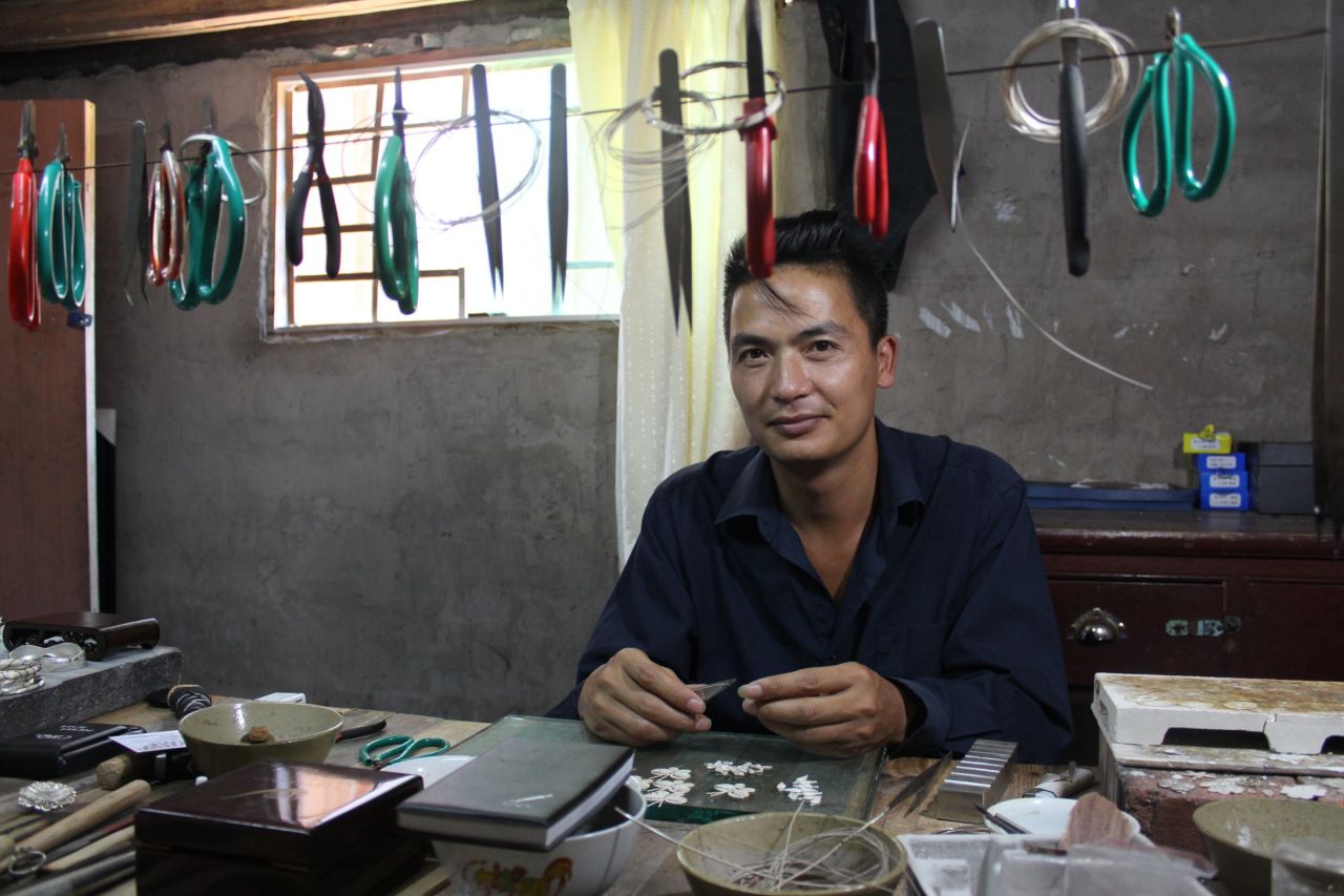 Long Taiyang is the 12th generation of his family to work as a silversmith.