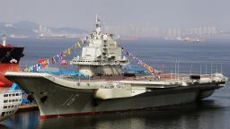 This file photo taken on September 24, 2012 shows China's first aircraft carrier, a former Soviet carrier called the Varyag, docked after its handover to the People's Liberation Army (PLA) navy in Dalian, northeast China's Liaoning province. China announced a further double-digit rise in its defence budget on March 5, 2013, underlining its military ambitions with Beijing embroiled in a series of territorial disputes with its neighbours. CHINA OUT AFP PHOTO / FILES (Photo credit should read STR/AFP/Getty Images)