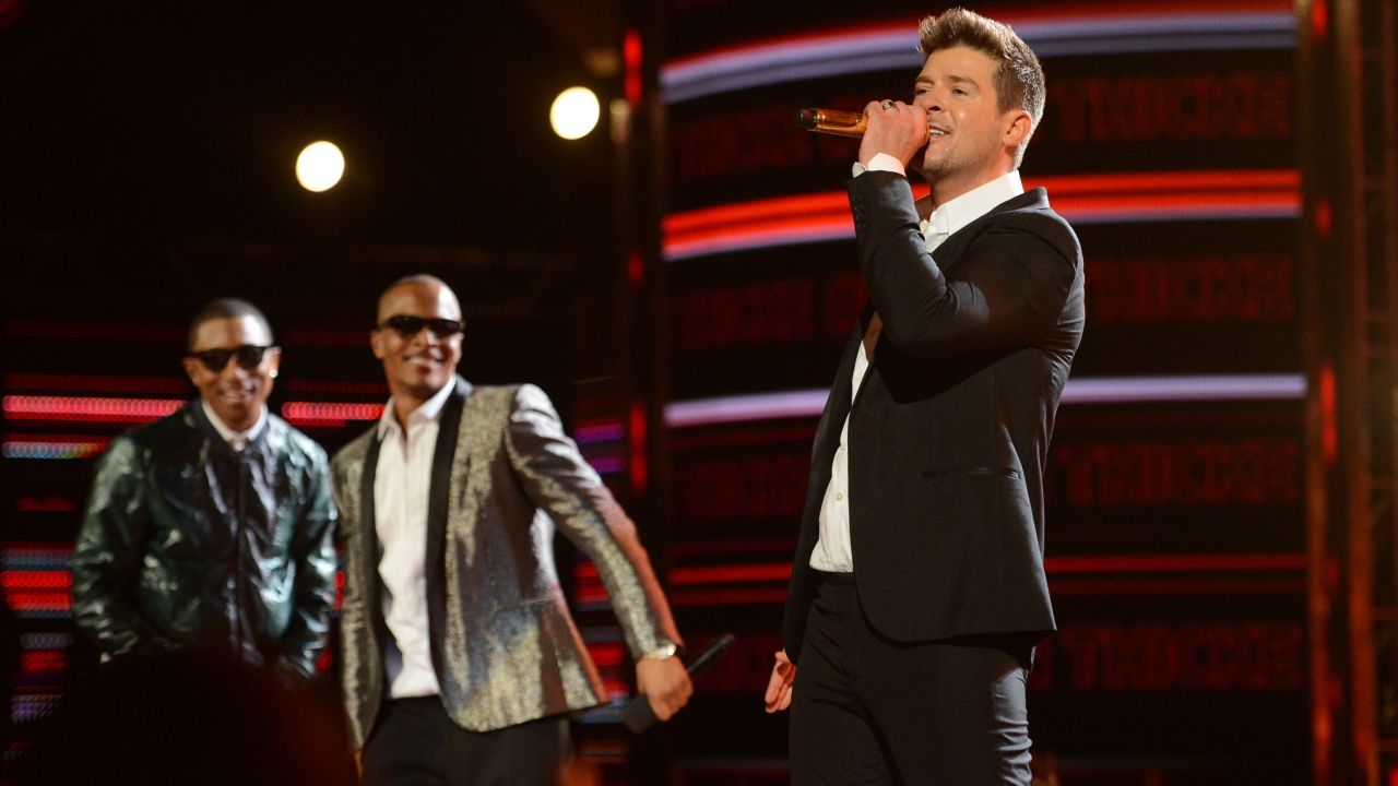 Pharrell Williams, T.I. and Robin Thicke performed on the hit track "Blurred Lines."