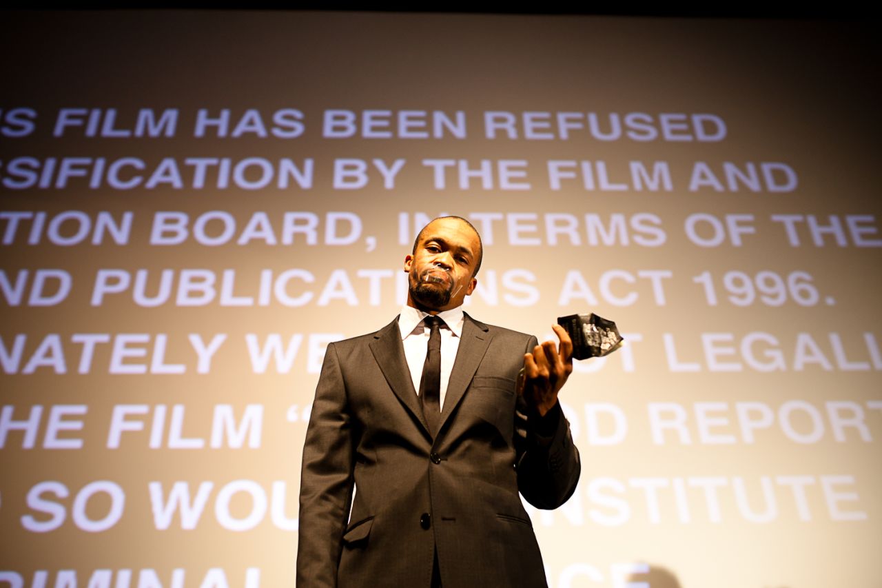 Qubeka with his mouth taped as a sign of protest after the announcement of the ban on "Of Good Report."