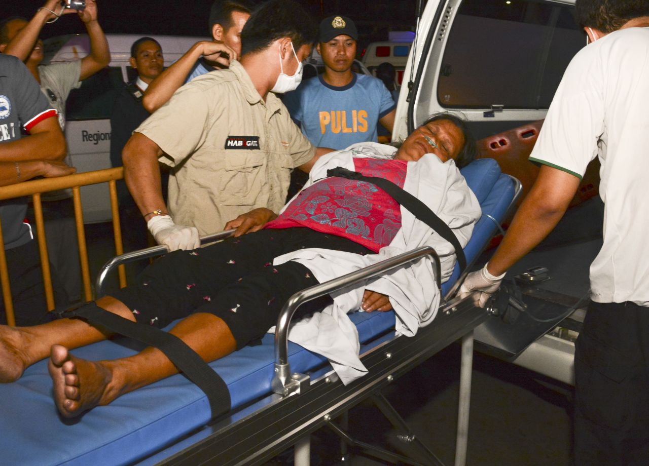 A survivor on a stretcher is taken to a hospital in Cebu City on August 17.