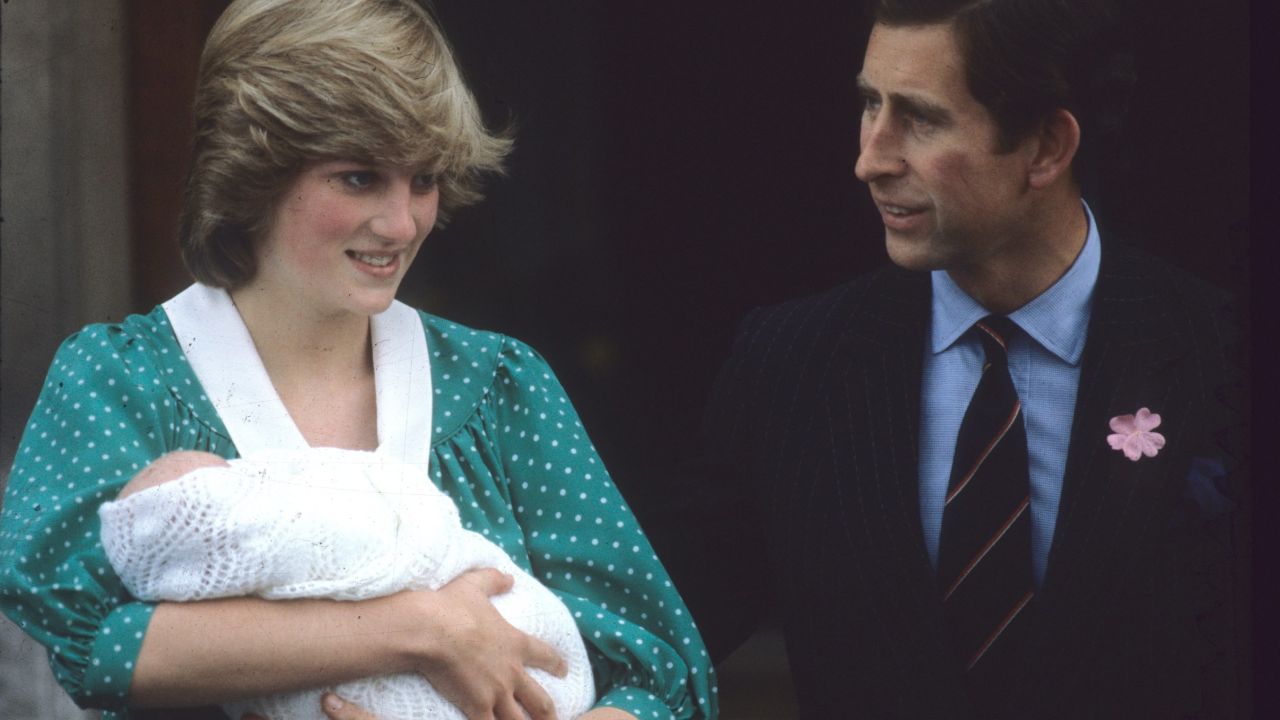 Diana and Charles leave the Lindo Wing of St Mary's Hospital in London with Prince Harry's elder brother, William, in July 1982.
