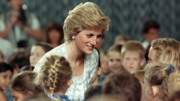 Diana listens to children during a visit to the British international school in Jakarta, Indonesia on November 6, 1989.