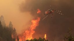 A helicopter battles the Beaver Creek fire on Friday, August 16 north of Hailey, Idaho.  