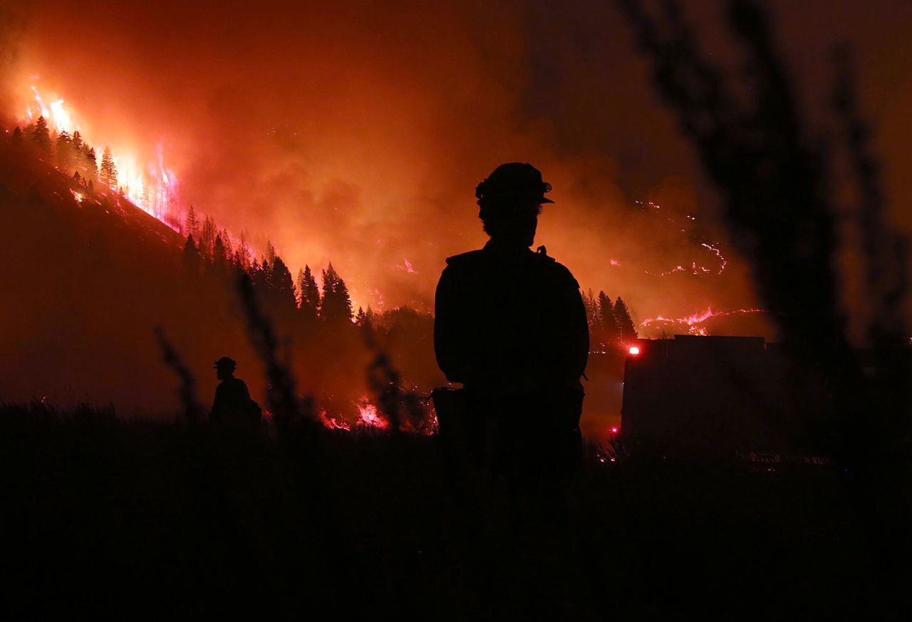 Members of the Idaho City Hotshots work on burn-out operations around Pine, where the Elk Complex fire was burning on August 14.