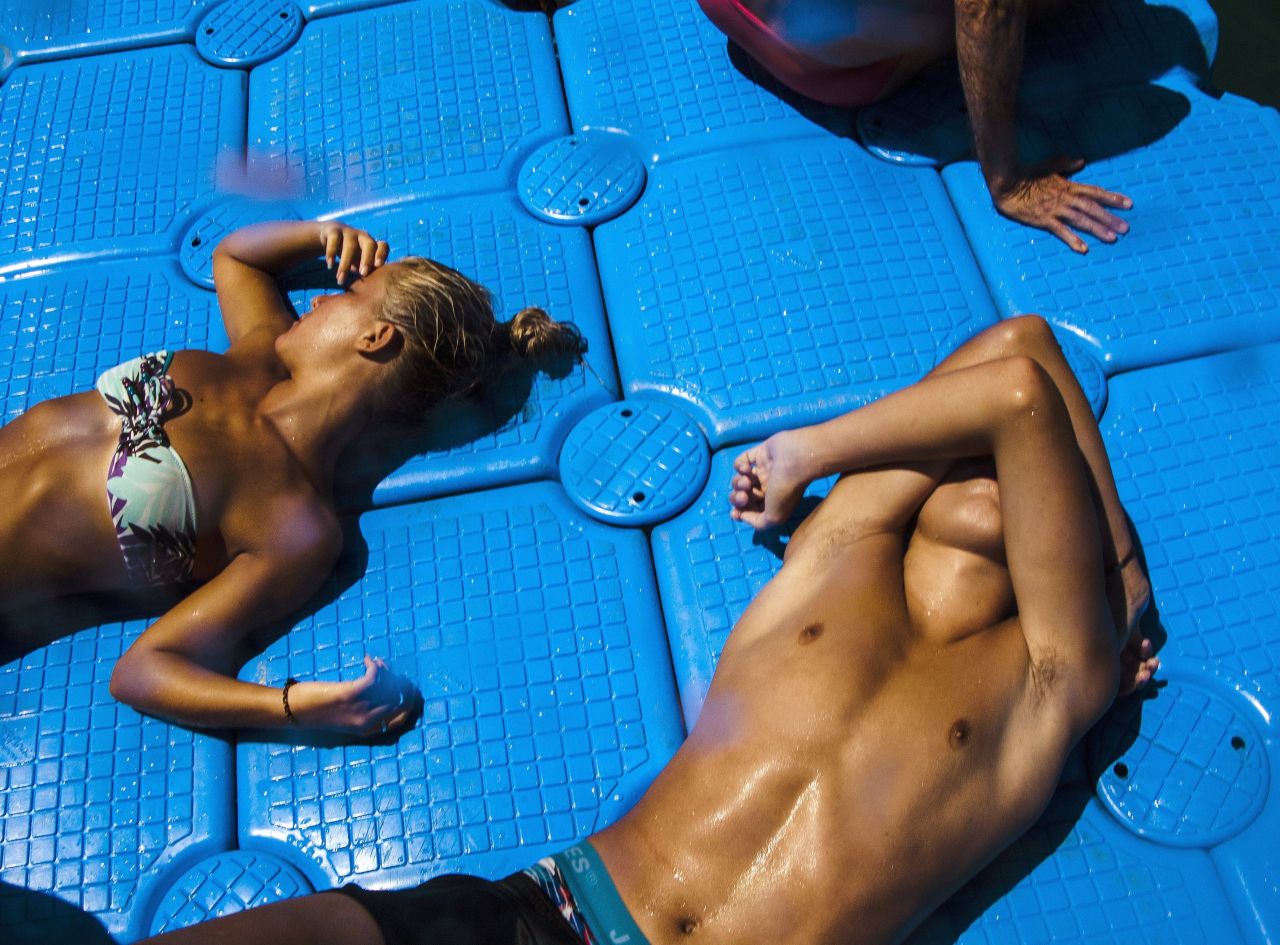 People enjoy the sea and the good weather on August 15 in Malaga, Spain.