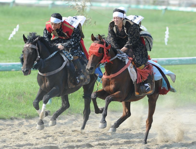 The elaborately attired warriors continue at Soma-Nomaoi festival in Japan, where samurai horsemen go head-to-head in three days of competitions.  
