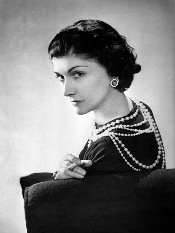 Coco Chanel was born as Gabrielle Bonheur Chanel on August 19, 1883, in Saumur, France. One hundred and thirty years later, the famed French couturier's legacy continues to shine. Here, Chanel strikes a coy smile in Paris in 1936. Click through the gallery to learn all about her iconic fragrance: Chanel No. 5.
