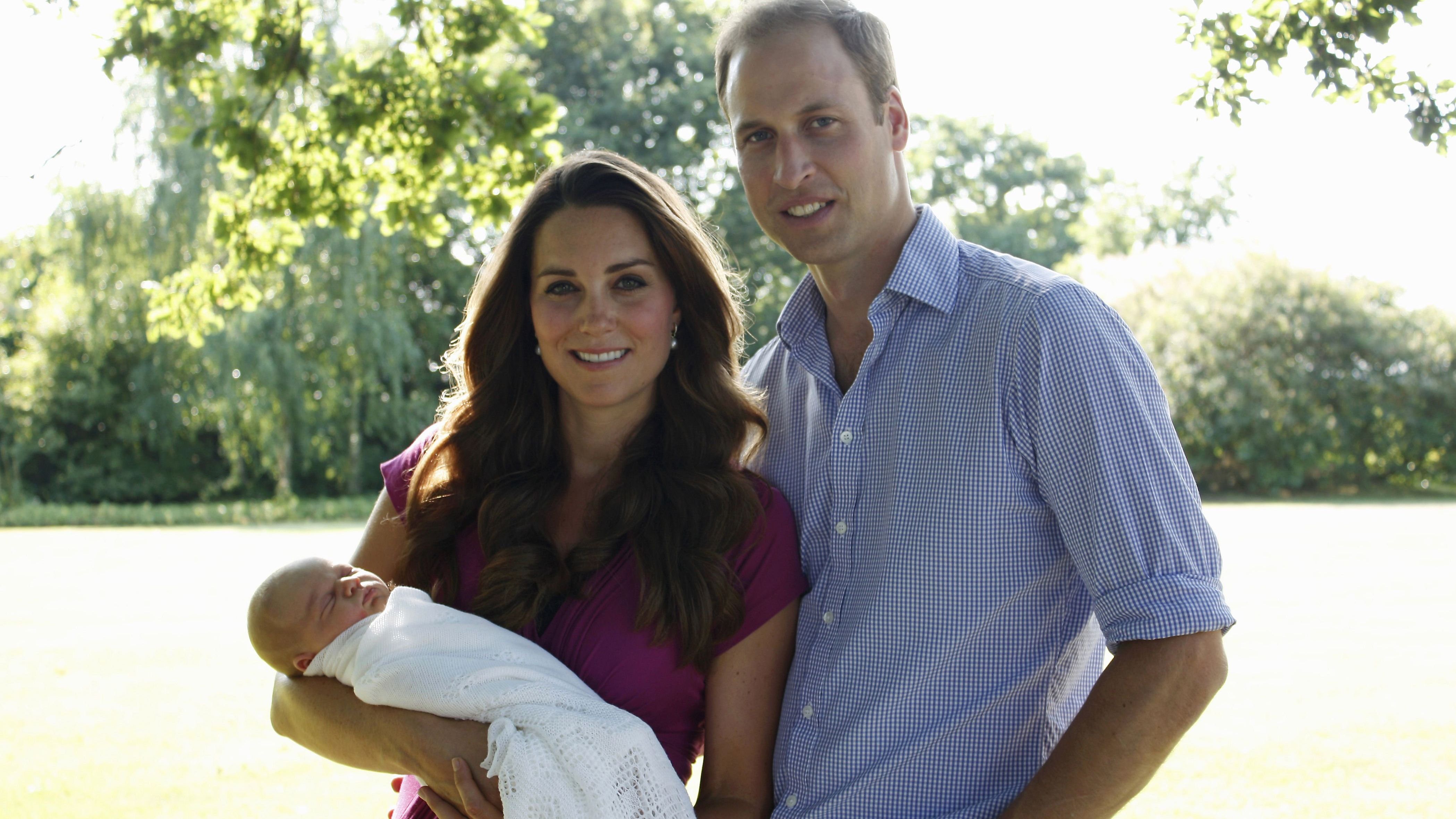The couple are pictured with their newborn boy, Prince George, in 2013. The new parents released two family photographs taken by Michael Middleton, Catherine's father.
