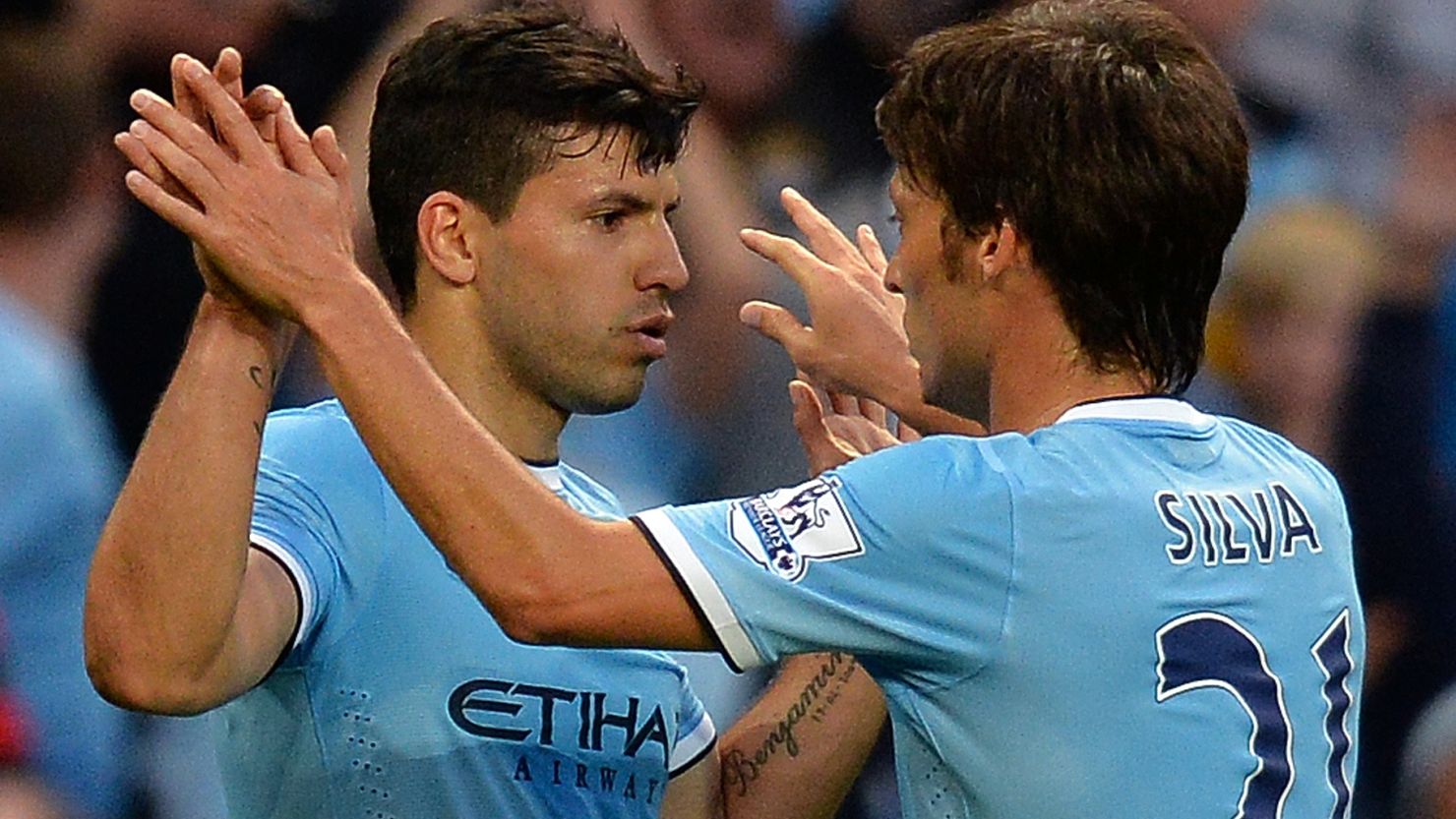 Sergio Aguero and David Silva celebrate scoring for Manchester City to help set up victory against Newcastle.