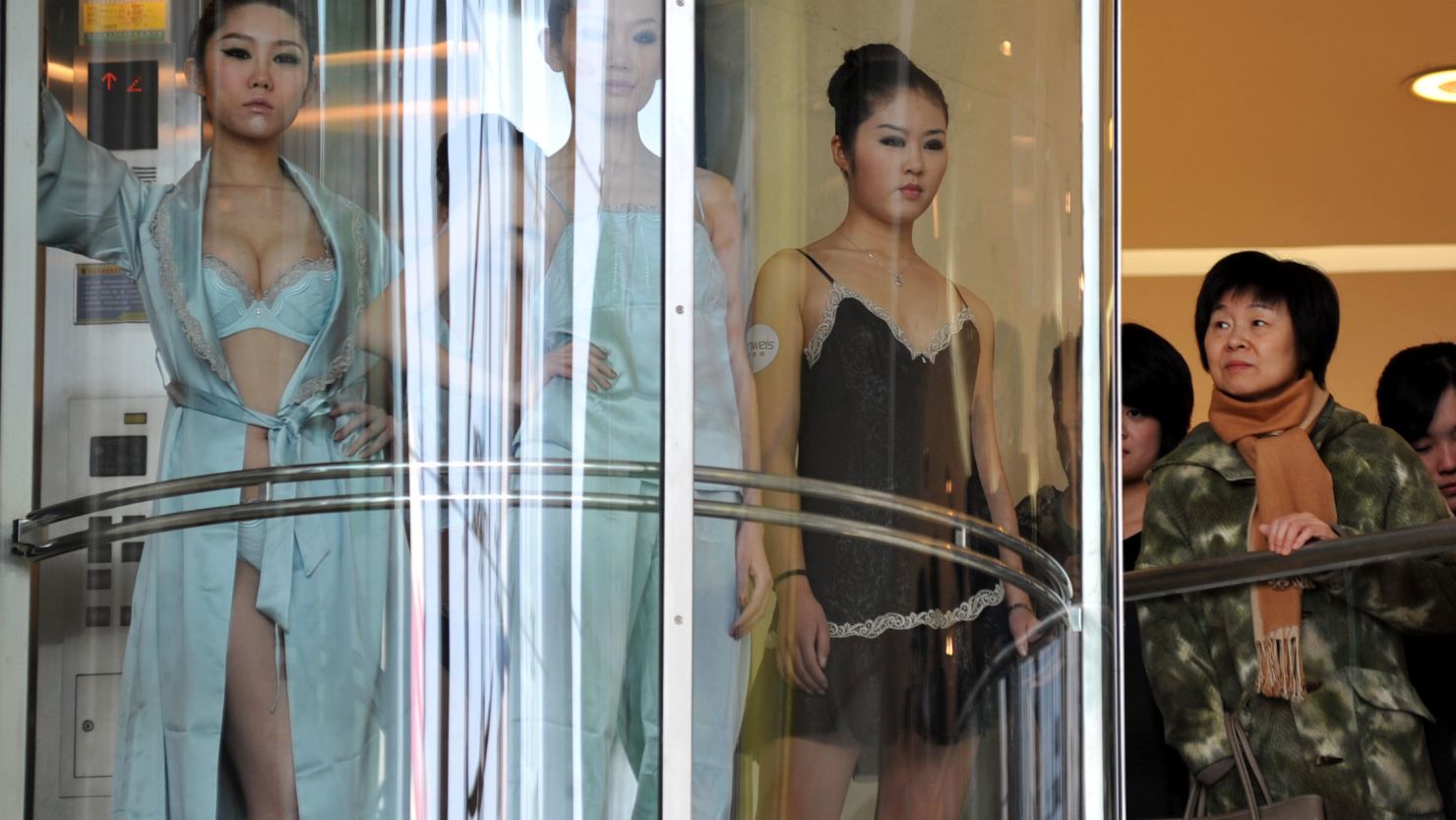 Models pose during a lingerie show on International Women's Day at a shopping mall in 2011 in Qingdao, Shandong.