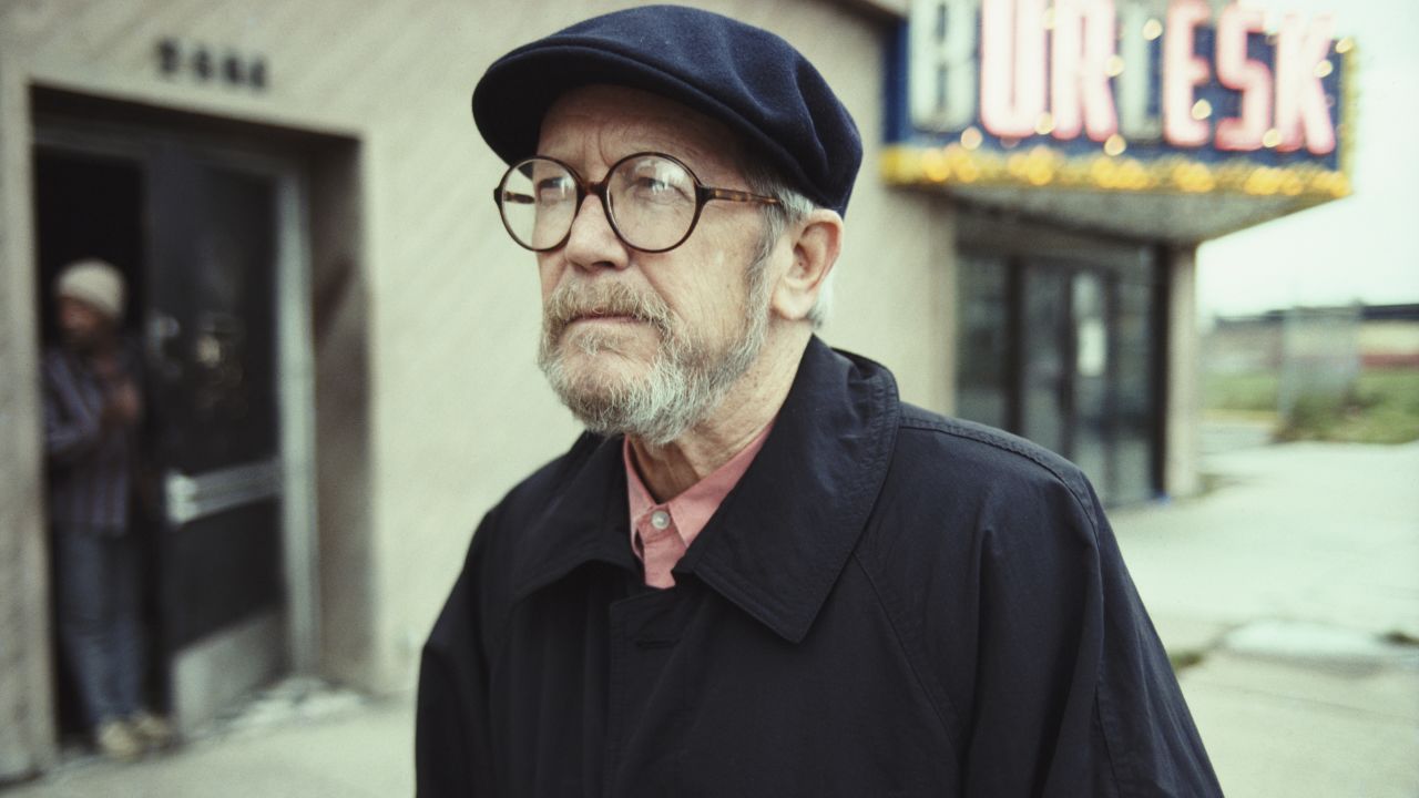 Leonard walks down a street in Detroit in November 1992.