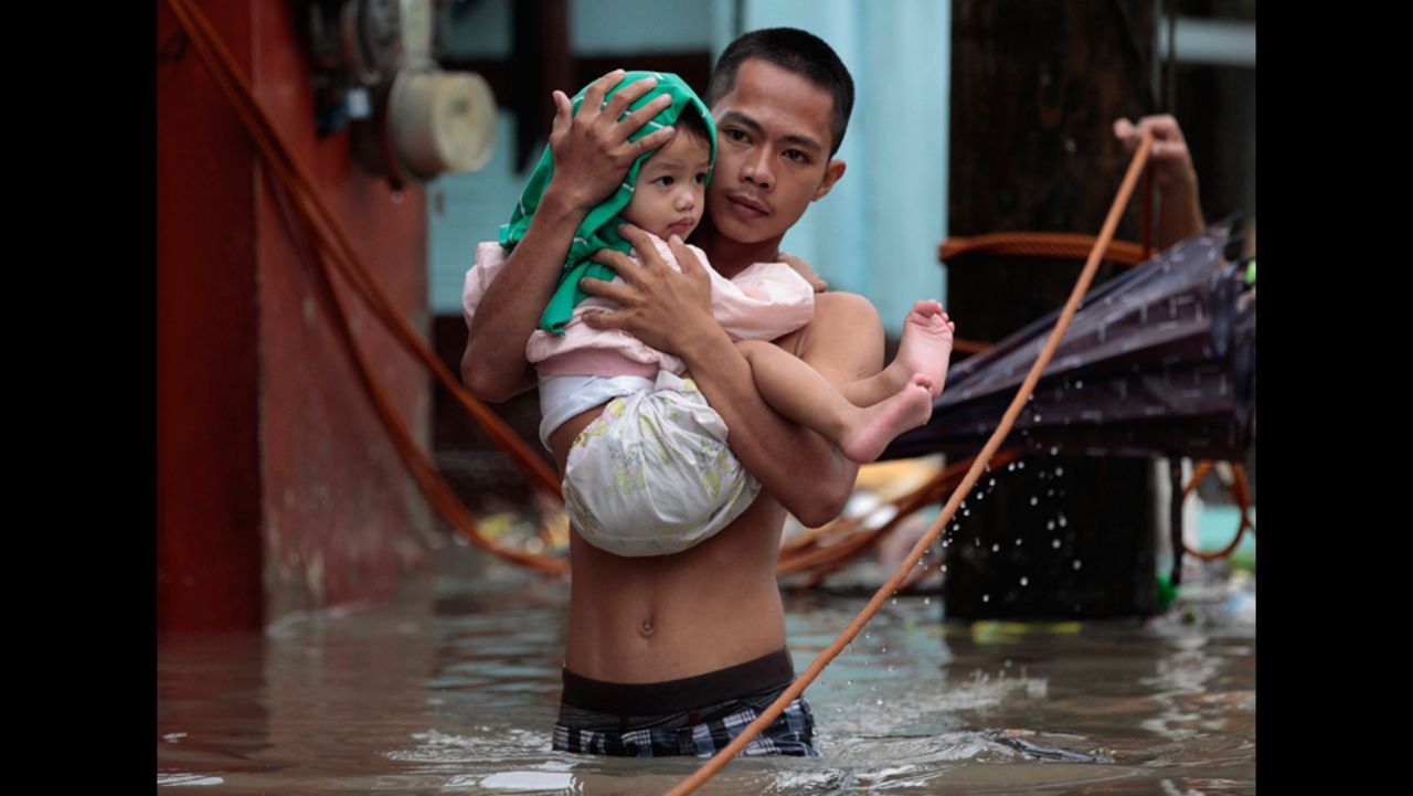 AUGUST 20 - LAS PINAS, PHILIPPINES: <a href="http://cnn.com/2013/08/20/world/asia/philippines-floods/index.html?hpt=hp_t3">Ferocious rain has caused heavy flooding in the Philippines capital of Manila</a> and the surrounding region, killing at least seven people, driving tens of thousands of others from their homes and bringing life to a standstill in many areas.
