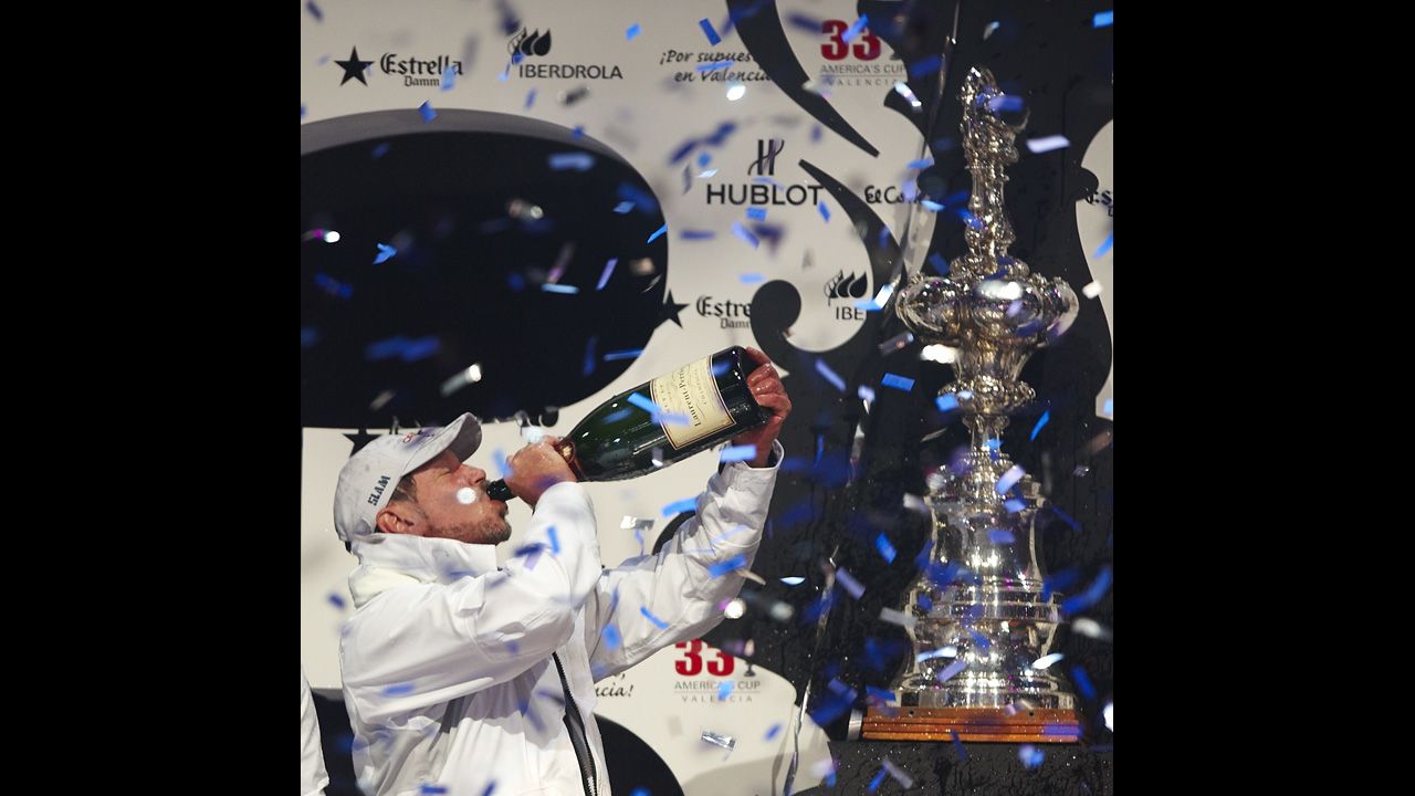 Larry Ellison, CEO of Oracle Corporation, partakes in a bit of fanfare after his team won the second race of the 33rd America's Cup off Valencia's coast on February 14, 2010, in Valencia, Spain.