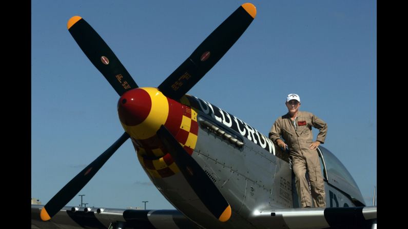 Jim Hagedorn, CEO of Scotts Miracle-Gro, poses in 2007, with his P-51 Mustang airplane. 