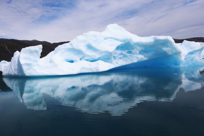 Calved icebergs from the Twin Glacier float July 30 near Qaqortoq.