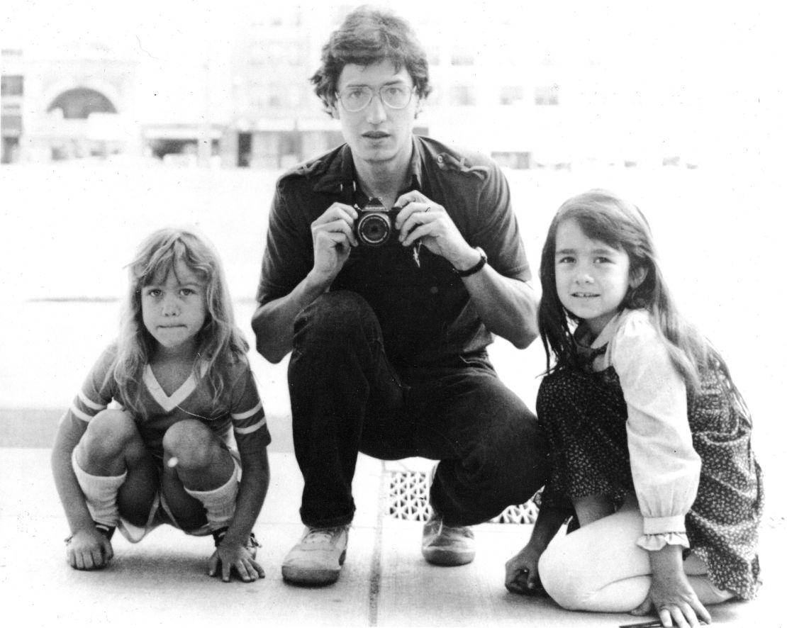 John Walker poses for a portrait with his daughters Lannie, left, and Keely in Minneapolis.