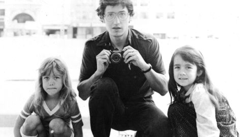 John Walker poses for a portrait with his daughters Lannie, left, and Keely in Minneapolis.