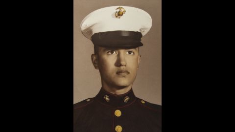 John Walker was awarded two Purple Hearts in Vietnam, his daughters say, after he stepped on a landmine.