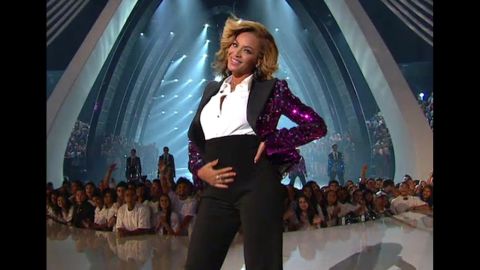  After Beyonce finished singing her hit "Love on Top," she dropped the mic, opened her jacket and revealed the baby bump that would become Blue Ivy. 