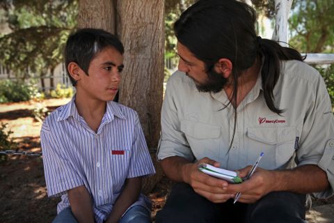 Mustafa meets with a Mercy Corps team member to talk about his experiences in Syria. Mercy Corps says trained psychosocial workers act as mentors by encouraging healthy self-expression and openness. 