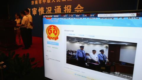 A screen shows online microblog updates from court for the trial of disgraced Chinese politician Bo Xilai, August 22 in Jinan.