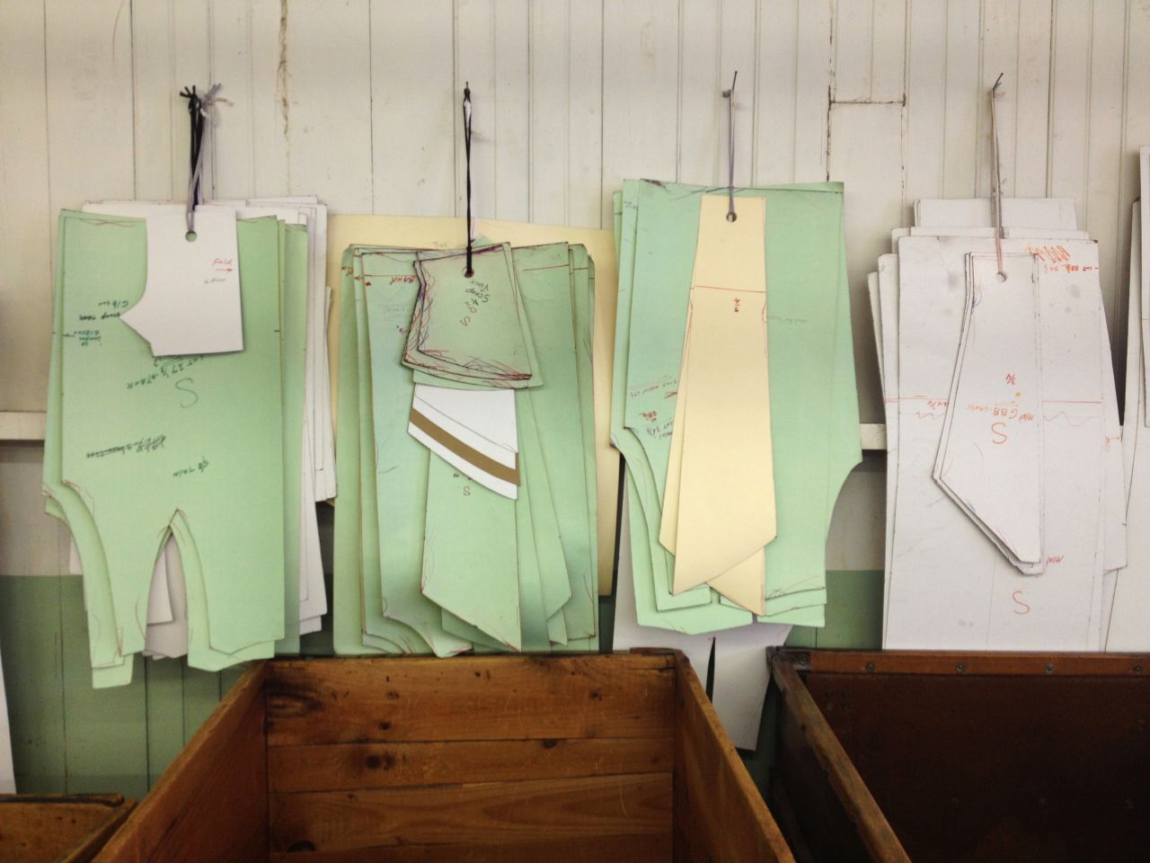 After the fabric returns from the processing plant, it goes to the cutting room to be cut into various patterns.