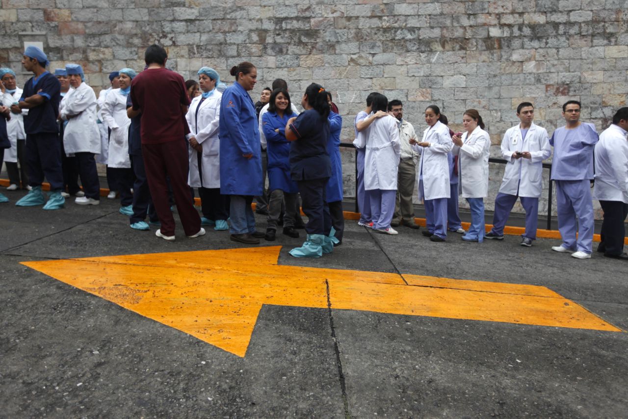 Medics are evacuated after a magnitude 6.1 earthquake shook a private hospital in Mexico City, on August 21. There were no immediate reports of damage or injuries, the United States Geological Survey reported.