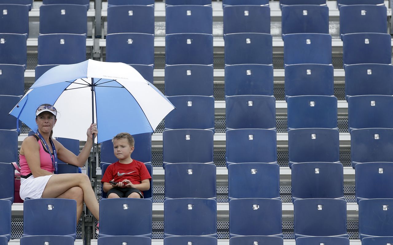 Tennis fans at the Winston-Salem Open broke out the umbrellas for shade in Winston-Salem, North Carolina, on August 20.