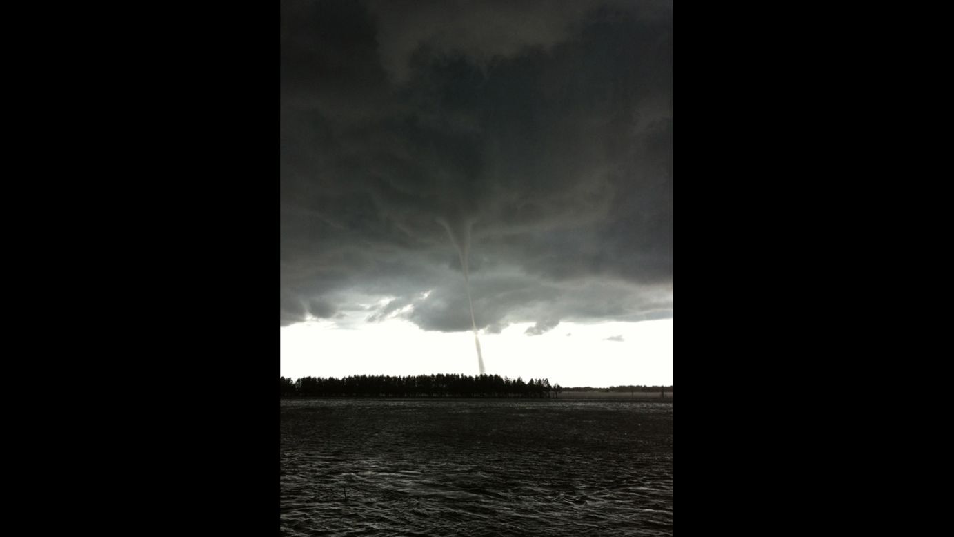 A tornado over the Songhua river in Daqing, China, on August 19. The tornado was followed by a hail storm, local media reported.  