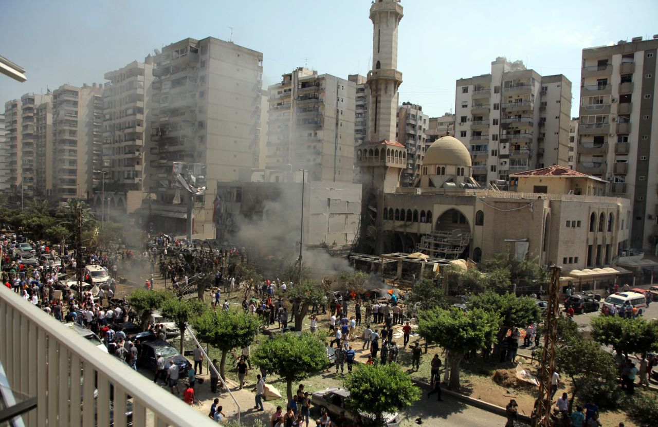 People gather outside the al Salam mosque.