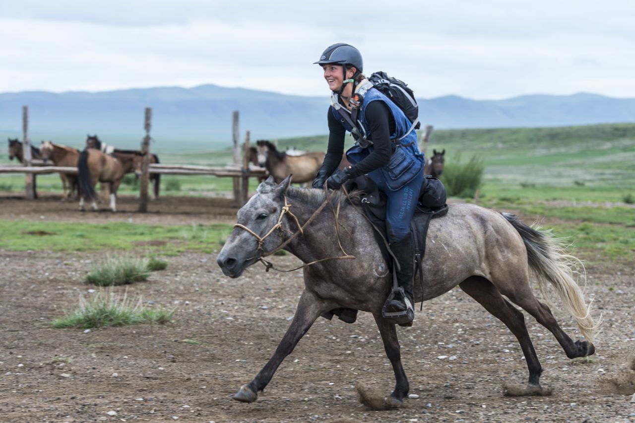 Lara Prior-Palmer, a 19-year-old from Hampshire in England, speeds out of one of the urtuus after swapping horses.