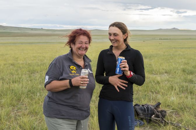 There's no champagne for Prior-Palmer at the finish, but she is able to enjoy a hard-earned beer.