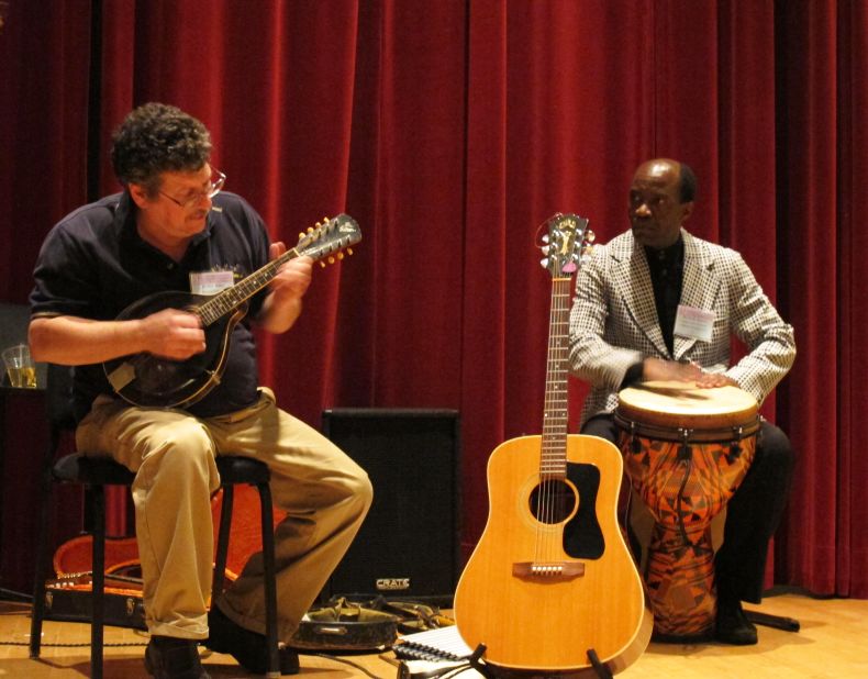 Music therapist Eric Miller performs with David Akombo, assistant professor of music education at Jackson State University, at the conference. Miller also demonstrated how biofeedback can be used in music therapy sessions. 
