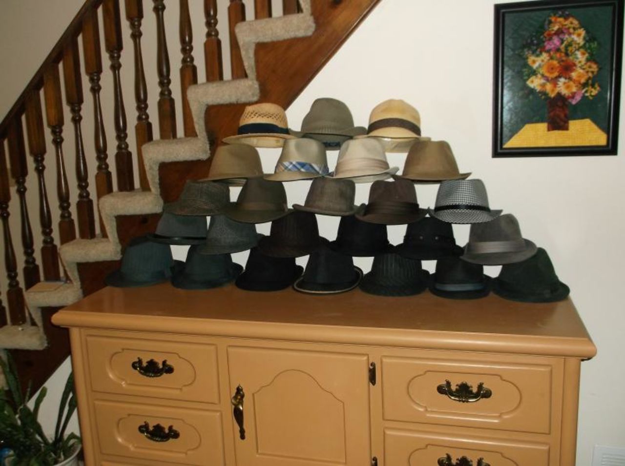 "At first, I just owned a couple of Fedoras, but then I bought a couple more. And, then I guess I got infected by the female shopping gene because, despite being extremely cheap, I got up to about a dozen hats," he wrote on the site. "I finally stopped at 25 when I realized I wasn't going to be around in another 14 months. Besides, I had just about covered all the colors."