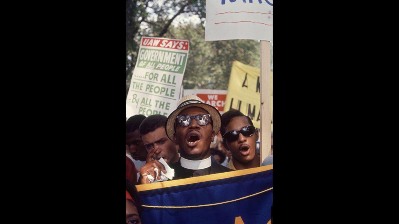 Protesters sing at the march.