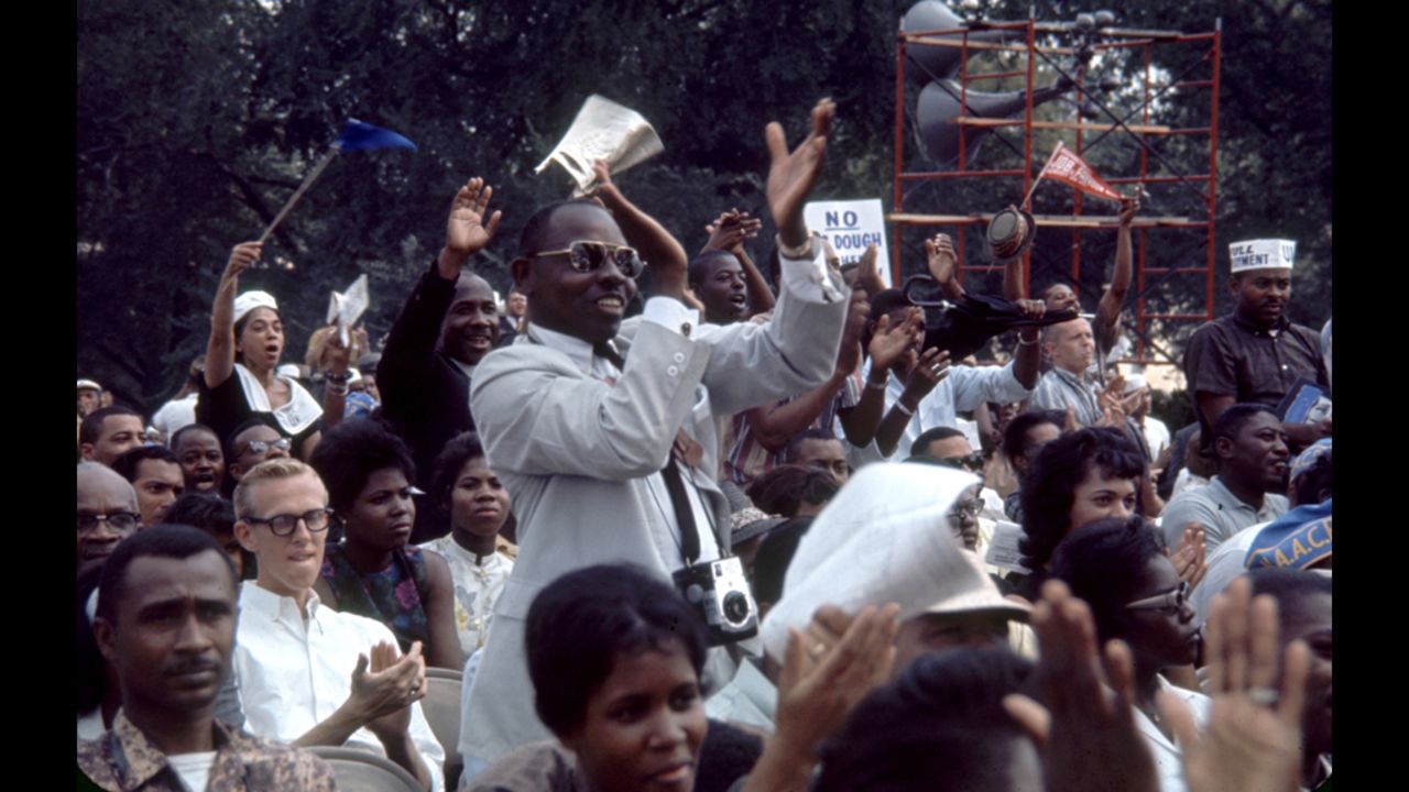 The crowd cheers during the event.