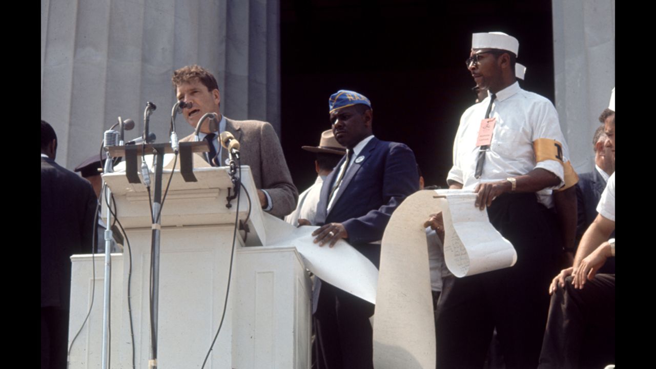 Actor Burt Lancaster speaks to protesters at the Lincoln Memorial at the event.