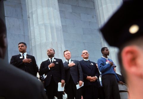 Civil rights leaders from left, Whitney Young Jr., Martin Luther King Jr., Walter Reuther, Eugene Carson Blake, and John Lewis stand on the steps of the Lincoln Memorial during the march.