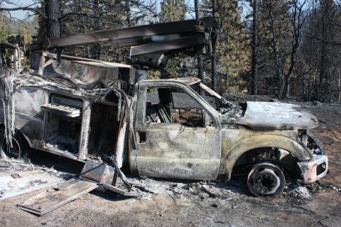 A truck sits scorched outside of Yosemite National Park on August 24. 