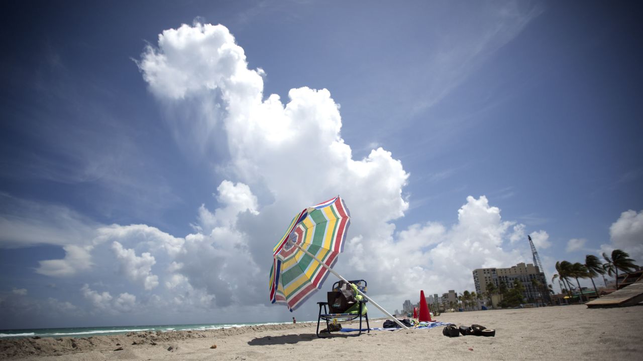 A beach chair and umbrella sit on Hollywood Beach, Florida, on Wednesday, August 21.