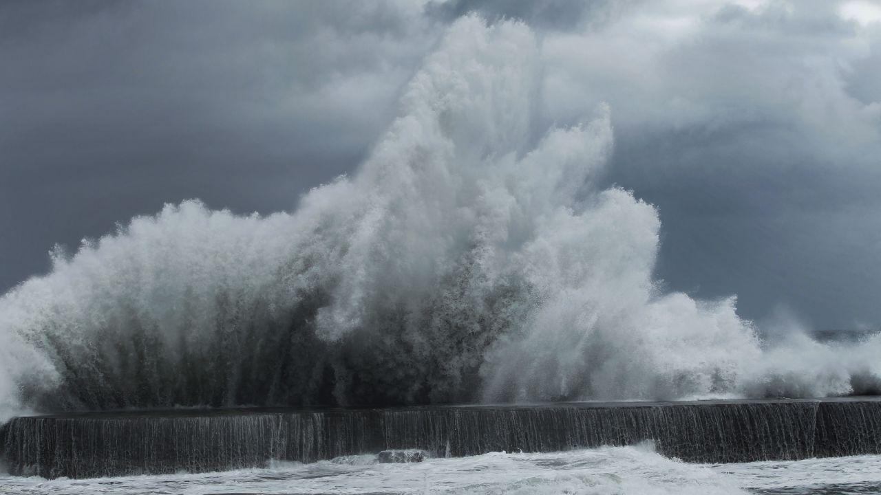 Massive waves from approaching Typhoon Trami slam into breakwaters near Toucheng, Taiwan, on August 21.