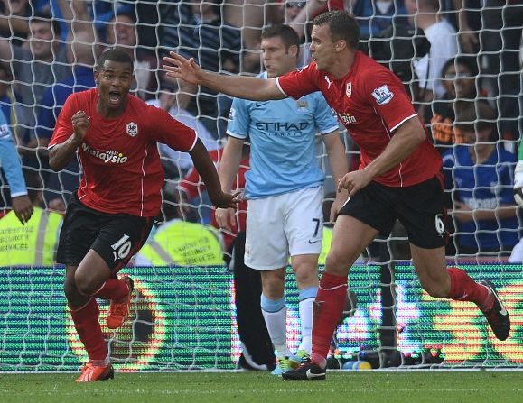 Cardiff striker Fraizer Campbell (left) celebrates with teammate Ben Turner (right) after scoring during the 3-2 victory over Manchester City.