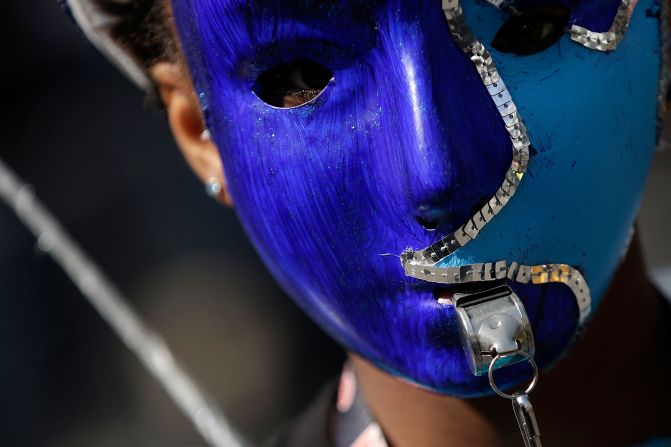 A merrymaker takes part in the London carnival on August 25.