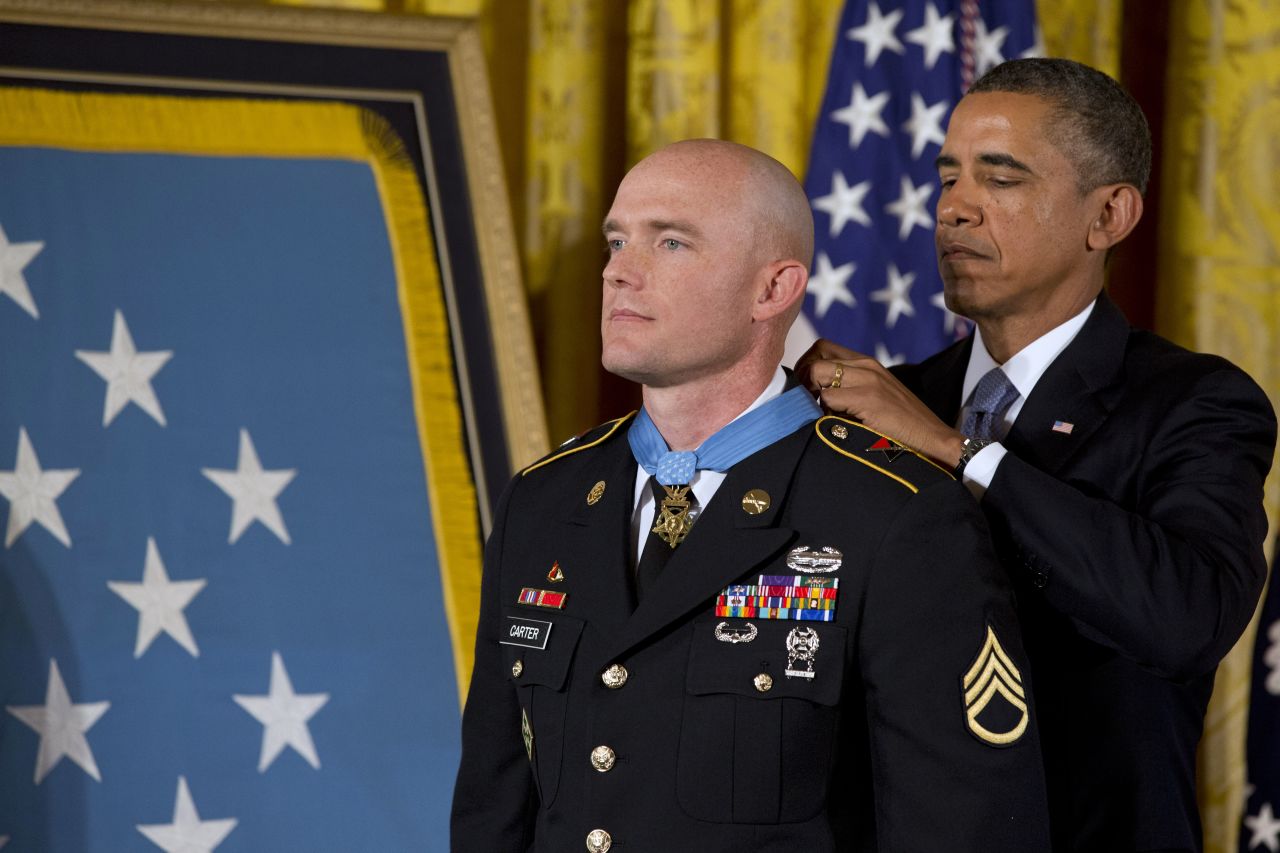 President Barack Obama awards U.S. Army Staff Sgt. Ty M. Carter the Medal of Honor on Monday, August 26. Carter received the medal for his courageous actions as a cavalry scout during combat operations in the Kamdesh District of Afghanistan's Nuristan Province on October 3, 2009. He is the fifth living recipient to be awarded the Medal of Honor for actions in Iraq or Afghanistan.