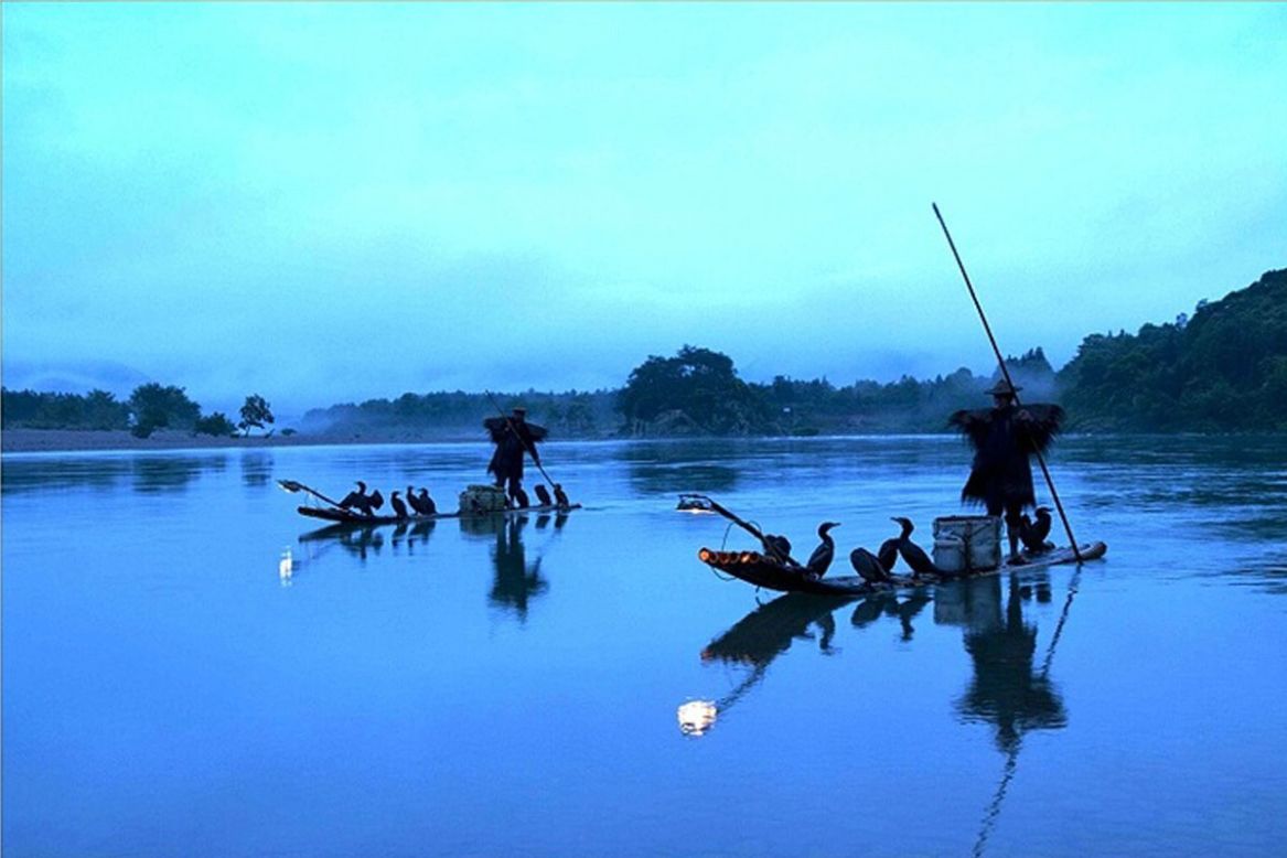 <strong>Nanxi River, Zhejiang:</strong> With its mountain backdrop and shores lined with ancient houses, the Nanxi River inevitably became the cradle of classic Chinese water-and-ink painting. It's also where travelers can watch local fishermen team with cormorants to catch fish.